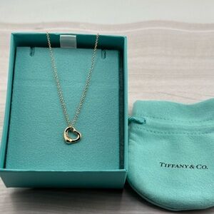 Tiffany & Co. 750 Yellow Gold Heart Pendant with Diamonds Necklace.